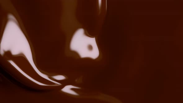 Super Slow Motion Shot of Swirling Chocolate Background at 1000Fps.