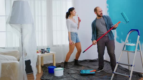 Joyful Couple Redecorating