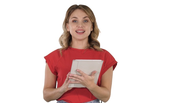 Presenter woman in red t-shirt holding a tablet turning