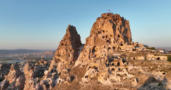 Aerial View of Natural Rock Formations in the Sunset Valley with Cave Houses in Cappadocia Turkey