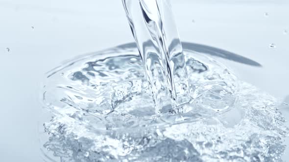 Super Slow Motion Shot of Pouring and Splashing Water at 1000 Fps