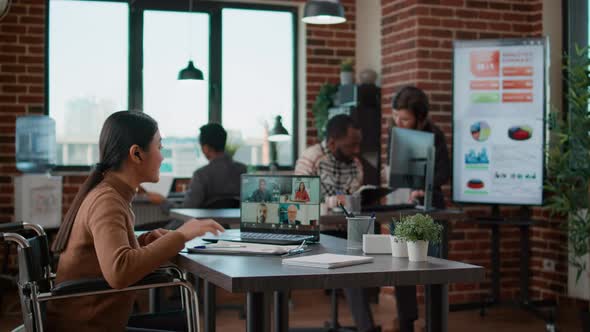 Diverse Team of People Meeting with Woman on Videocall