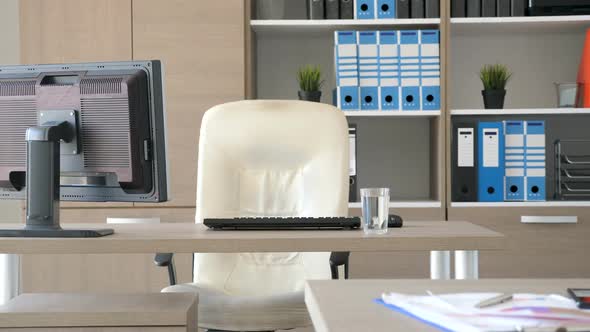 Empty Modern Office with Computers and Laptop on Desks