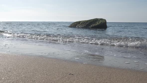 Sea Surf. Seashore with Stones