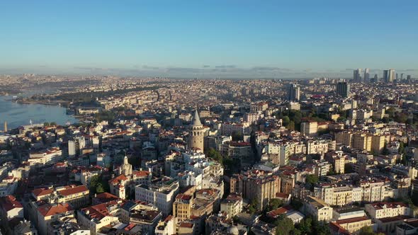  footage of bosphorus in the sunset having galata tower in the middle 