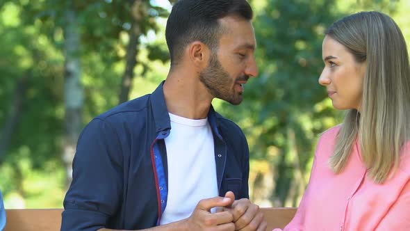 Sad Lonely Man Sitting Bench in Park Watching Couple in Love Admiring Each Other