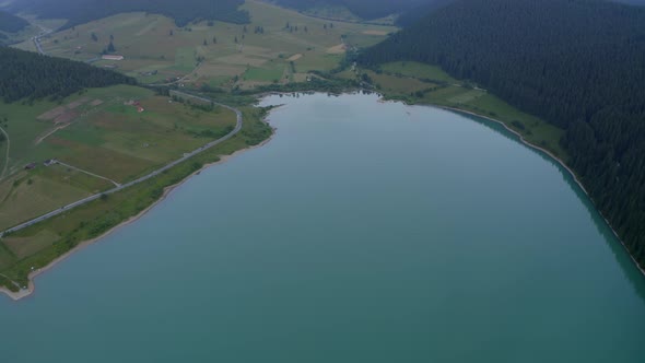 Farming Lands And Frumoasa Dam In Frumoasa, Harghita County, Romania. aerial
