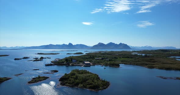 Fly over idyllic islands on a nice sunny summer day, Northern Norway, Northern Scandinavia, idyllic