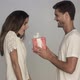 Man surprising girlfriend with gift - VideoHive Item for Sale