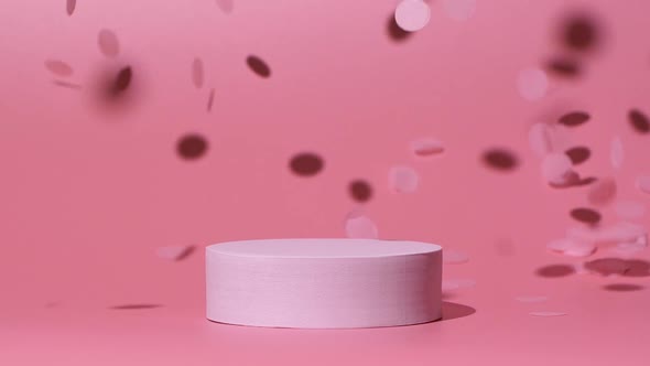 Cosmetics Product Mockup with Confetti Falling on Pink Background in Slow Motion