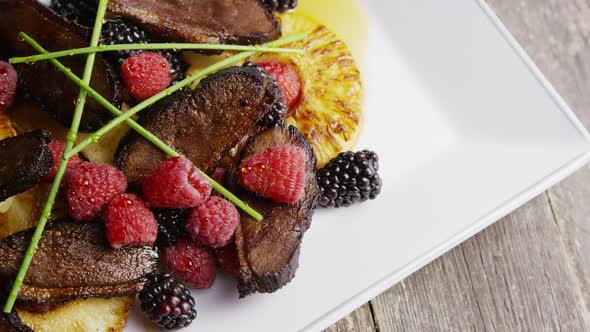 Rotating - smoked duck bacon with grilled pineapple, raspberries, blackberries and honey