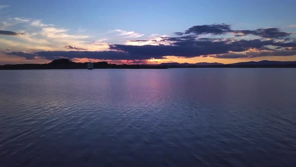 water lake above aerial drone fly sun people nature beach summer board tree low berlin paddle forest