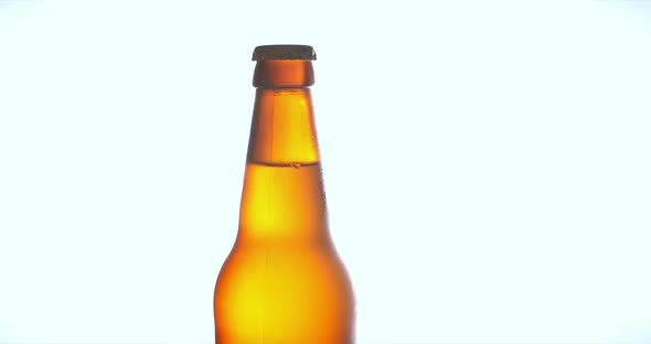 Bottle of Beer on the White of Background, Fresh Beer, Cold Light Beer a With Drops of Water