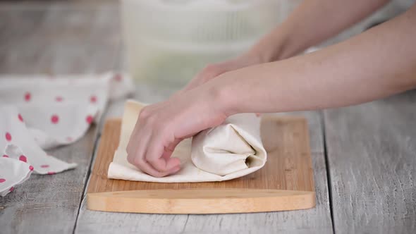 Woman is Cooking Pita Bread Roll with Chicken and Vegetables