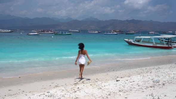 Happy Cheerful Woman Running to the Yacht Through Sandy Marine Seaside Excitement of Ocean Trip with