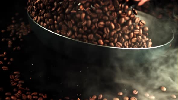 The Super Slow Motion of the Coffee Beans is Stirred in a Hot Pan