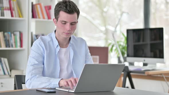 No, Rejecting Young Man Waving Finger at Work