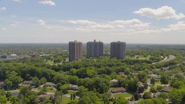 Aerial Tilt Down Shot of Tall Buildings in Great Neck Village