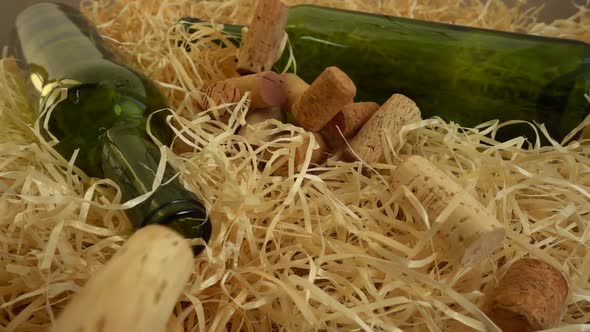 Falling wine corks on straw. Slow motion.