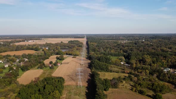 Establishing Aerial View Of Power Lines In A Small Rural Town