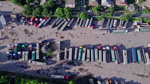 Semi Trucks Loading Cargo Containers