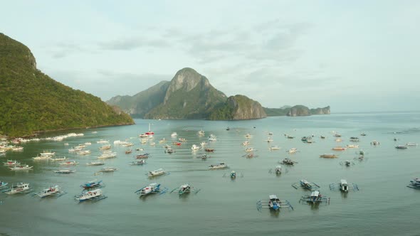 WS AERIAL Lots of boats in harbor and sea, El Nido, Palawan, Philippines