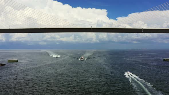 Aerial Video Boats Passing Under The Sunshine Skyway Bridge