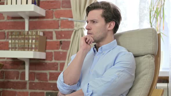 Ambitious Young Man Thinking About Creative Idea