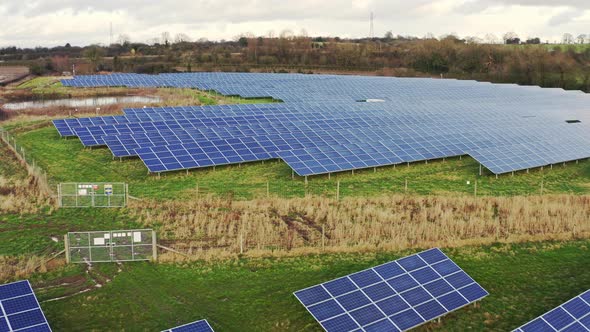 A solar farm in Staffordshire, thousands of Solar Panels capturing the sun's natural light and conve