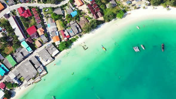 Natural birds eye abstract view of a white sandy paradise beach and blue sea background 