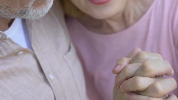 Senior Couple in Love Hugging and Holding Hands, Enjoying Time Together