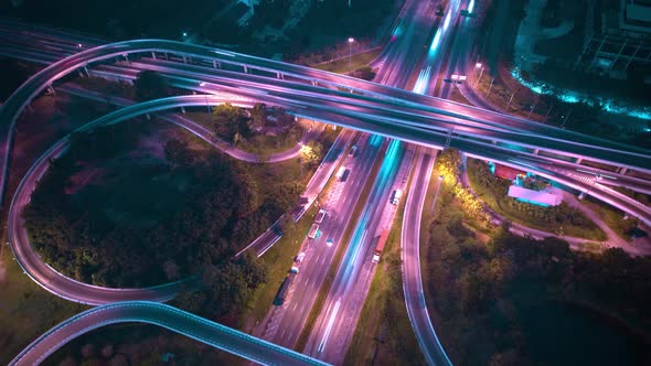 4K : Aerial Hyper lapse drone view of road junction with moving cars.