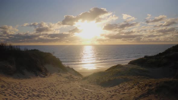 The sun setting over seconds beach at Cape Patterson Victoria.