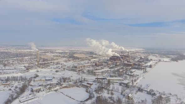 Aerial View of Smoking Pipes in Industrial Zone in Winter