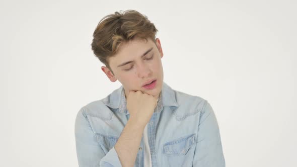 Young Man Taking Nap on White Background