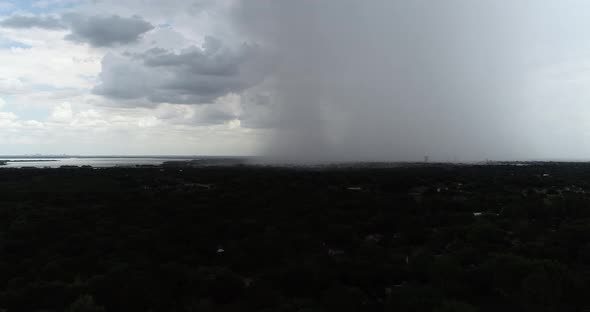 Aerial video of rain and storms over Lake Lewisville in Texas.