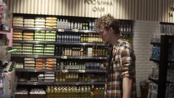 Young Guy in Supermarket