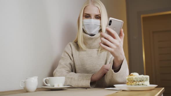 Girl in a Protective Mask Takes a Selfie