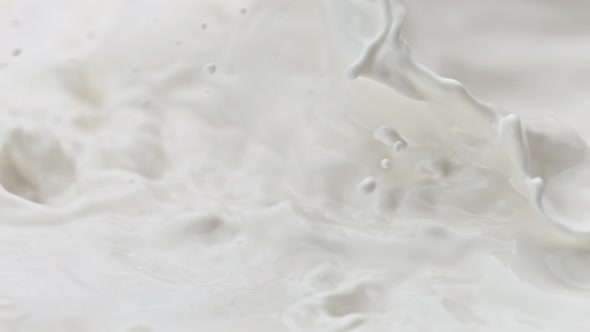 Super Slow Motion Shot of Splashing Fresh Cream at 1000 Fps