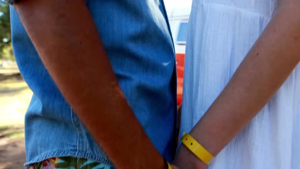 Romantic couple standing face to face in park