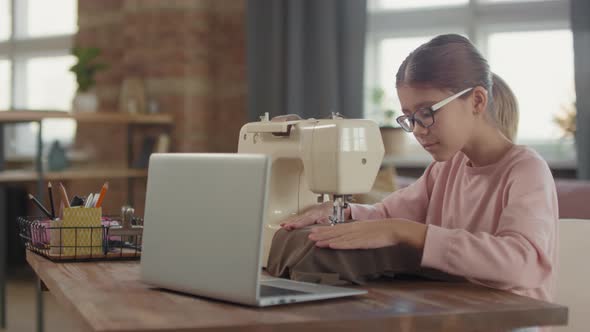 Girl Having Online Sewing Lesson