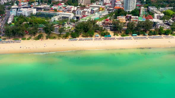 Flying along Karon Beach and the tourist area on the island of Phuket in Thailand, the Indian Ocean