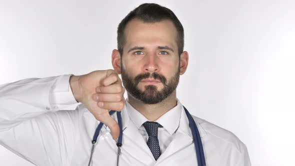 Portrait of Doctor Gesturing Thumbs Down