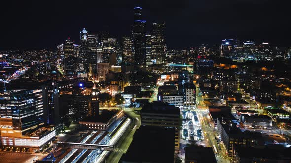 Downtown Seattle City Streets And Buildings At Night Aerial Hyperlapse