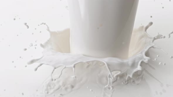 Super Slow Motion Shot of Pouring and Splashing Fresh Milk at 1000 Fps