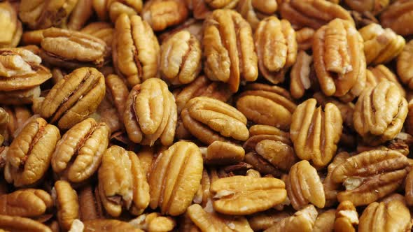 Pecan Nuts Background. Closeup Pekan Seeds