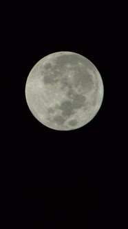 Vertical Video of the Full Moon in the Night Sky