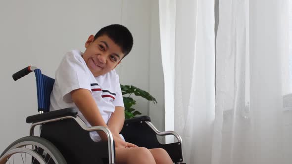 Disabled boy in a wheelchair.