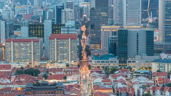 Aerial View of Chinatown and Downotwn of Singapore Day To Night Timelapse