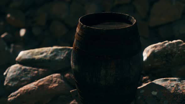 Old Wooden Barrel on the Rocks